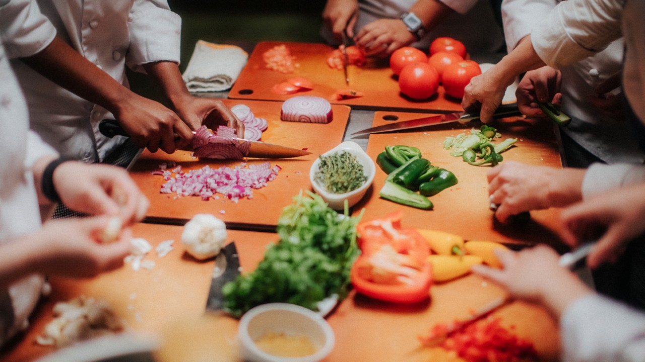 collection of people cutting vegetables