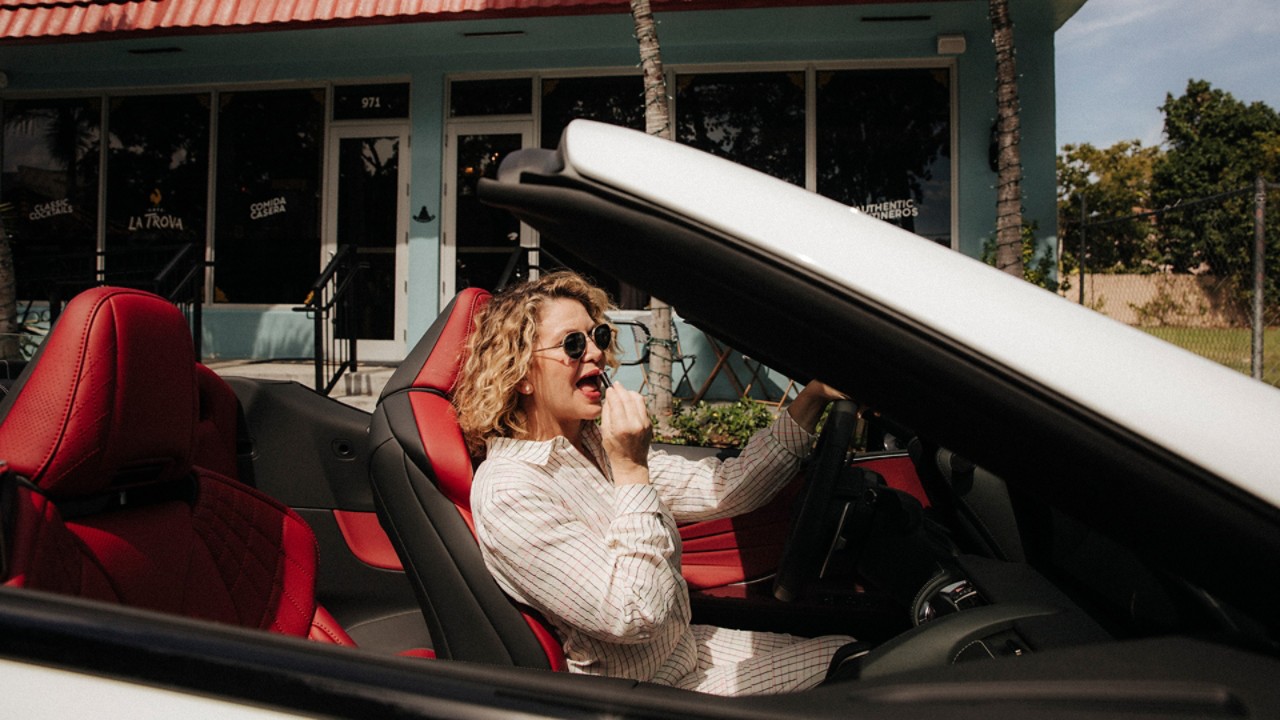 Michelle Bernstein driving in a Lexus car