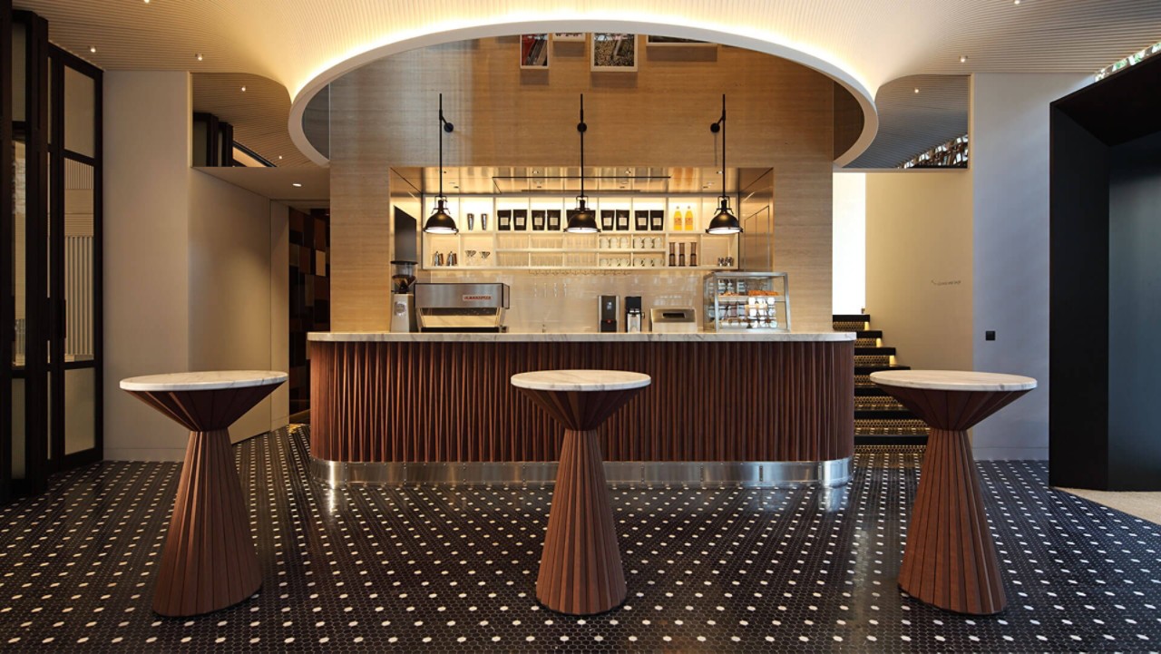 wide shot of different chairs in front of a canteen Intersect by Lexus Tokyo