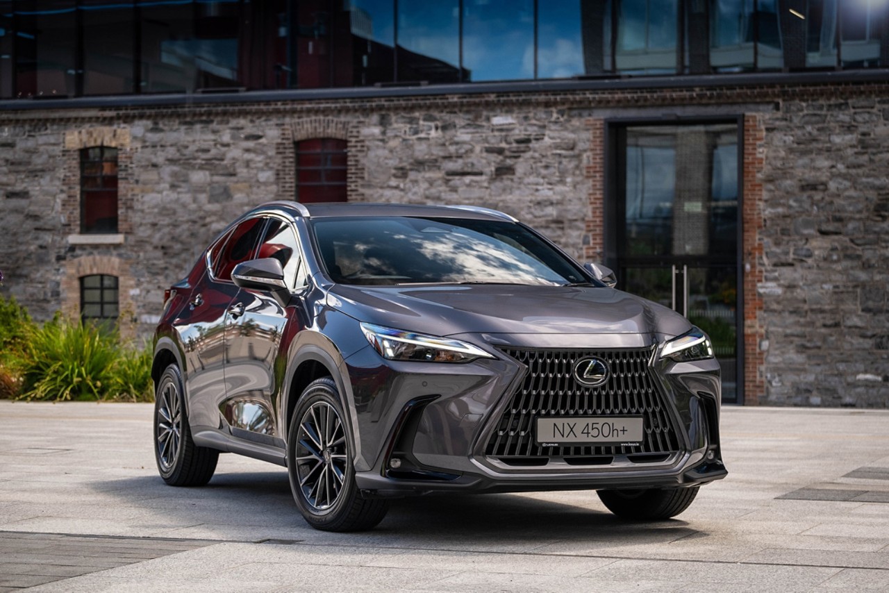 Lexus NX driving down a corridor